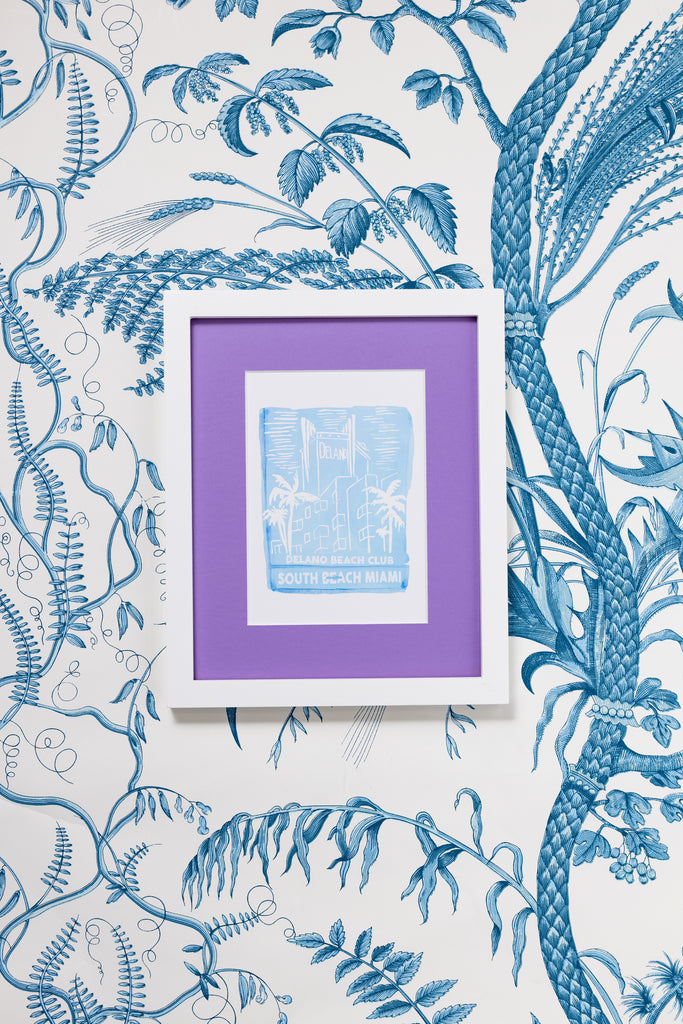 Delano South Beach Matchbook - Furbish Studio, A matchbook watercolor print illustrating the exact place of Delano South Beach with a baby blue and white paint in a 5x7 white frame with a wallpaper background