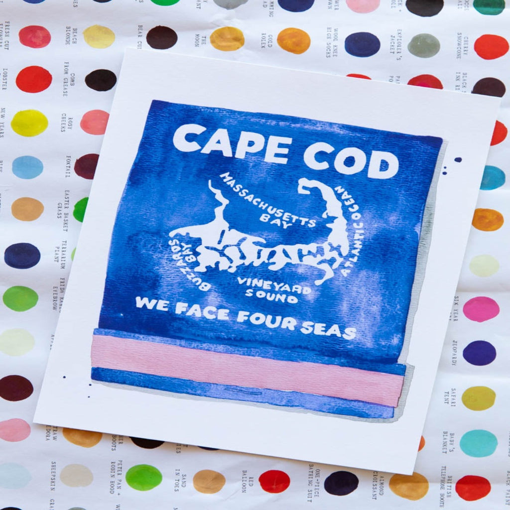 Cape Cod Matchbook - Furbish Studio, An unframed Cape Cod Matchbook watercolor print featuring a hook-shaped peninsula of the U.S. state of Massachusetts and the names of four seas painted in white on top of a colorful paper
