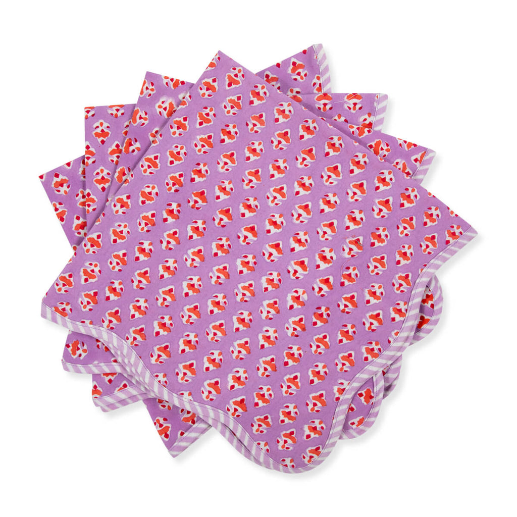 lilac block print handmade napkins with orange flowers and striped scalloped edge