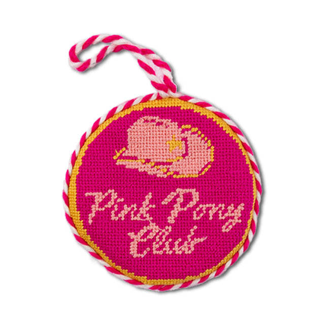 Pink needlepoint charm with elephant design and 'Pink Pony Club' text on a white background