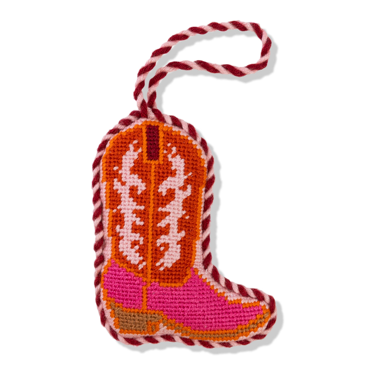 Decorative cowboy boot ornament with pink and orange design on a white background