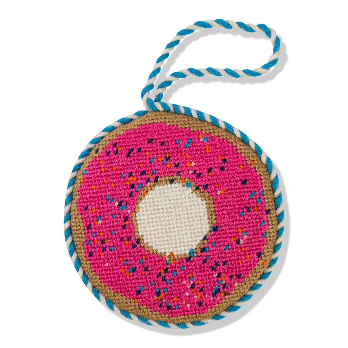 Donut-shaped toy with pink sprinkles and blue rope on a white background