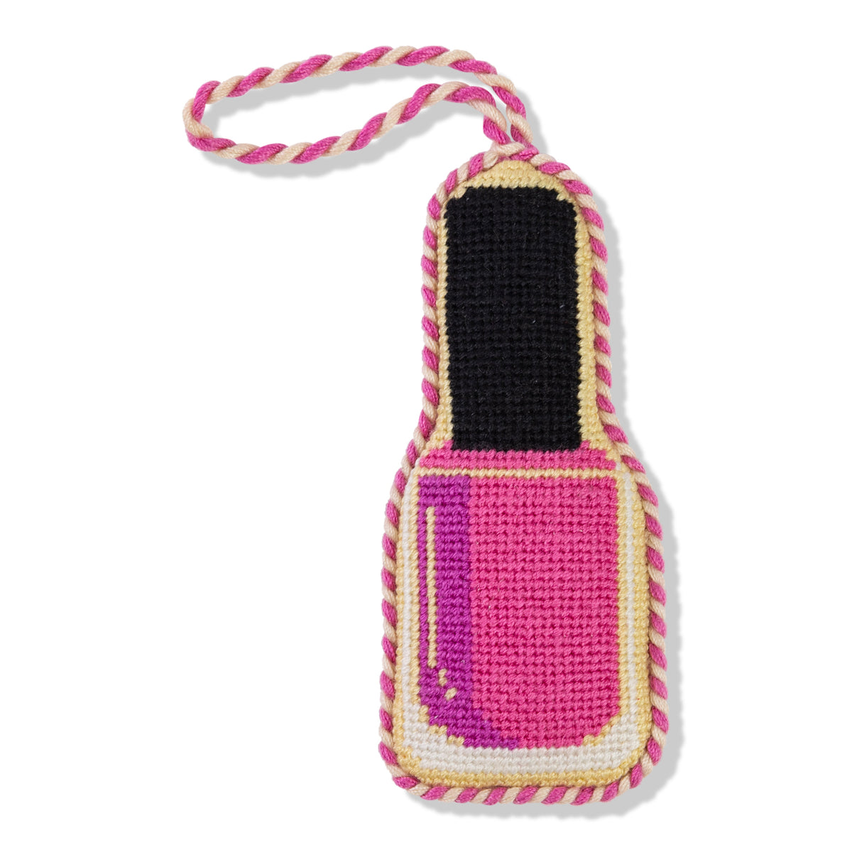 Dog toy shaped like a pink nail polish bottle with a rope handle on a white background