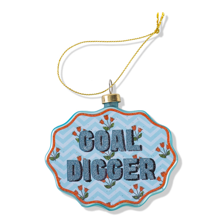 Decorative ornament with 'Goal Digger' text on a blue and orange zigzag pattern.