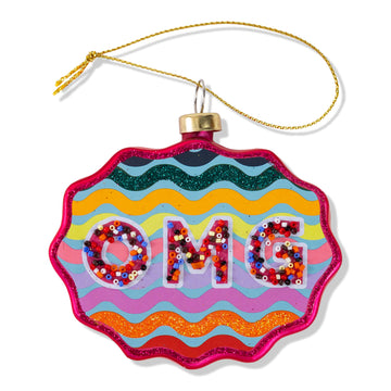 Colorful ornament with 'OMG' text on a white background