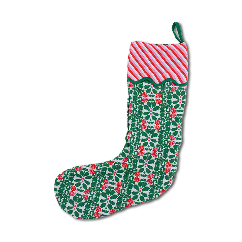 Christmas stocking with green and red pattern on a white background