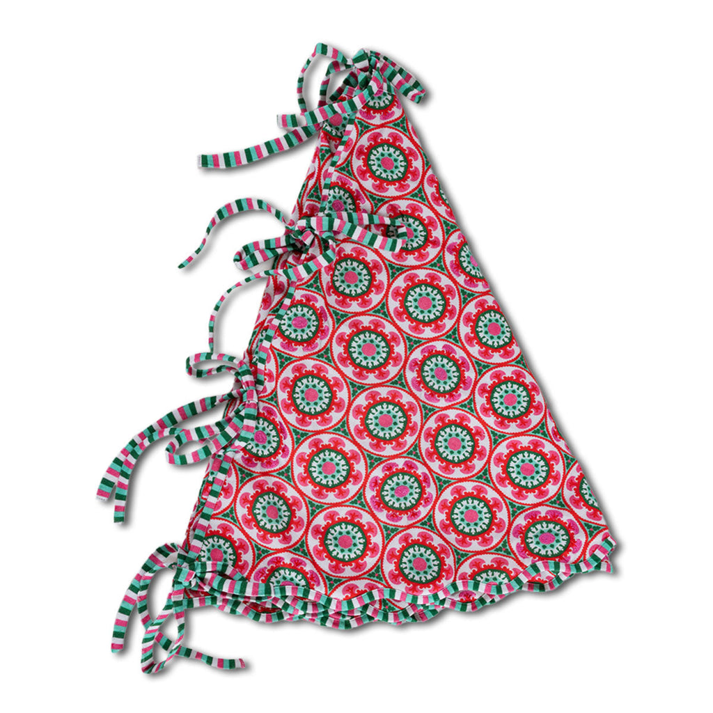 Colorful patterned dress with tie straps on a white background