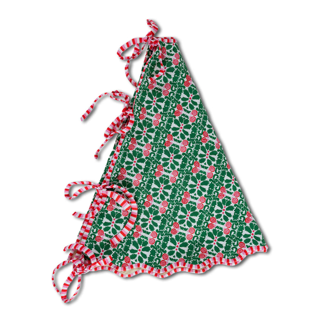 Green dress with red floral pattern and white trim on a white background
