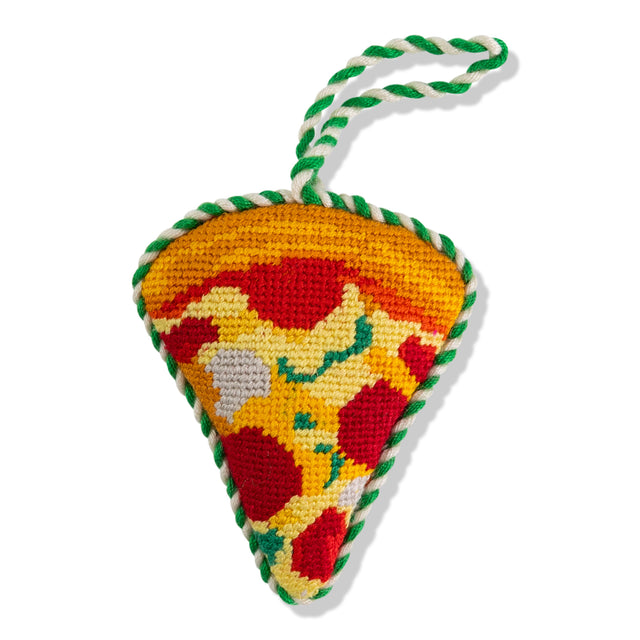 Triangular knitted toy with a colorful pattern on a white background