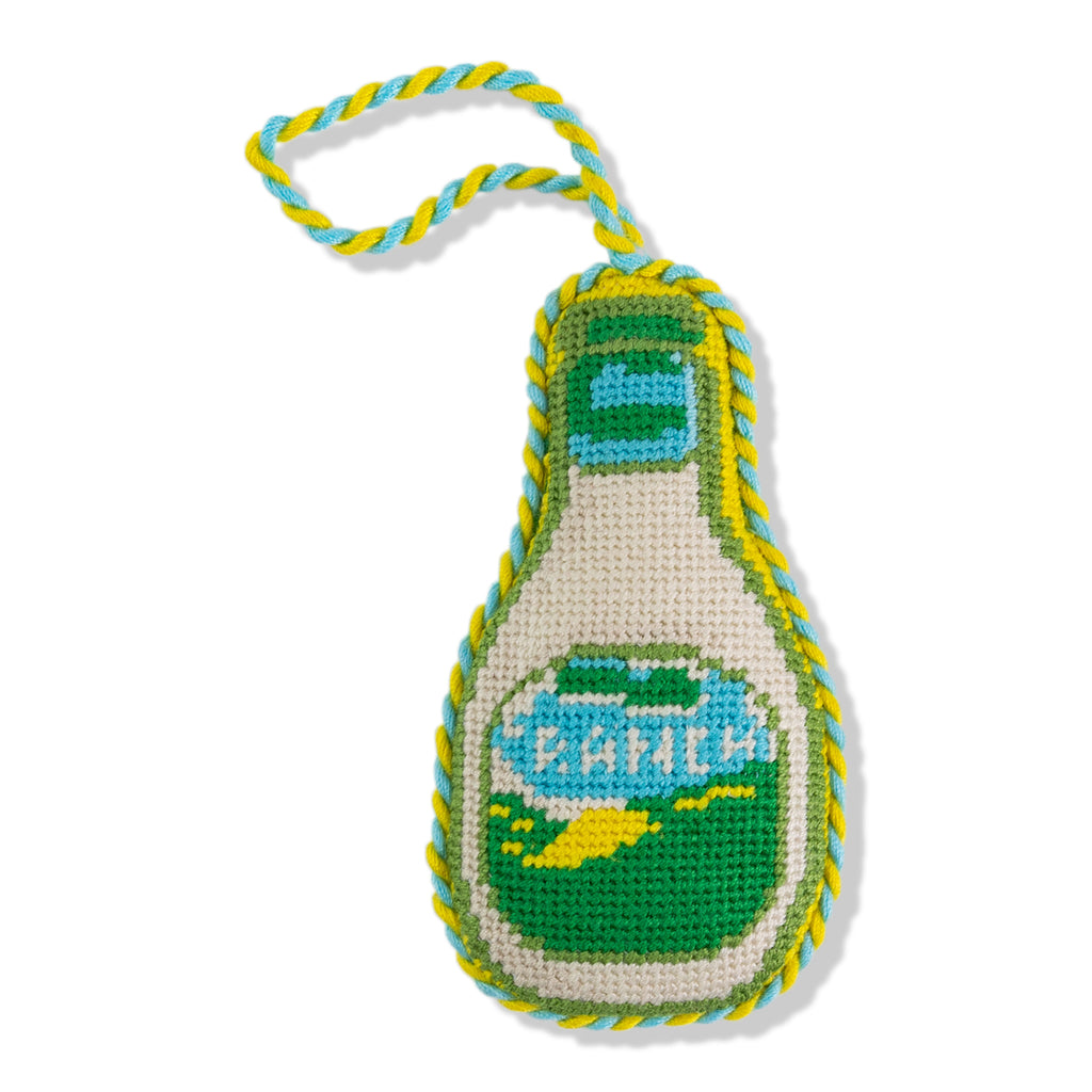 Crocheted bottle-shaped toy with 'Pepsi' branding on a white background