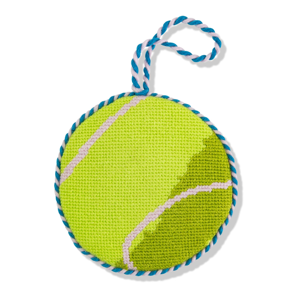 Green tennis ball with a blue and white rope on a white background