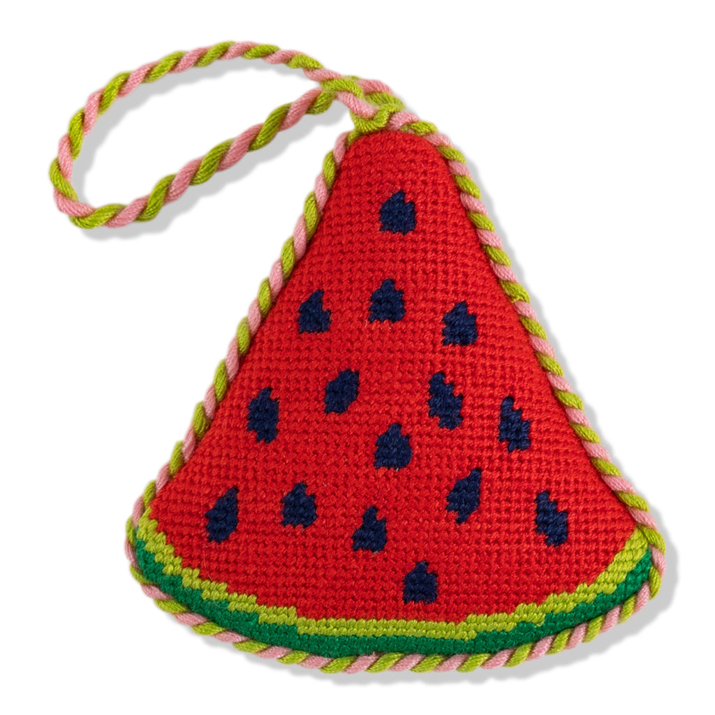Triangular watermelon-shaped toy with a rope handle on a white background