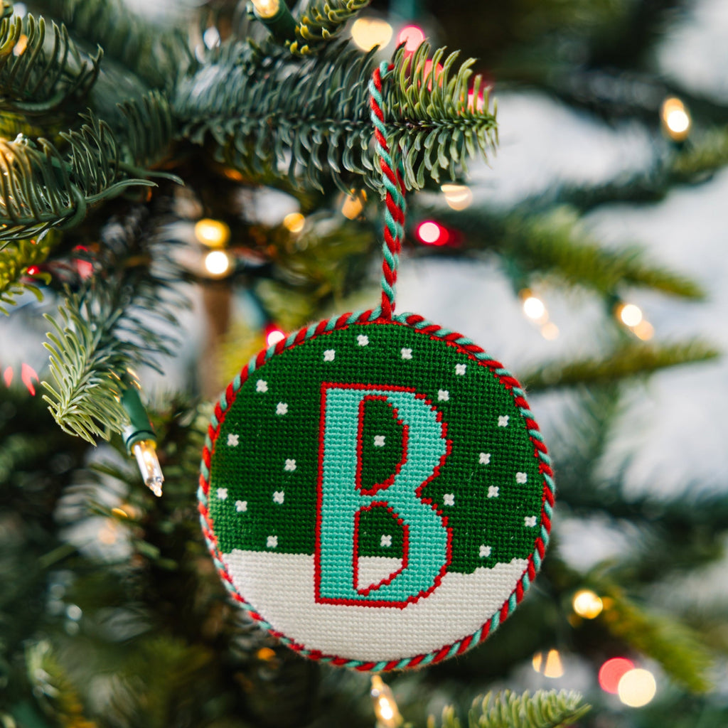 Christmas ornament with letter 'B' on a decorated tree