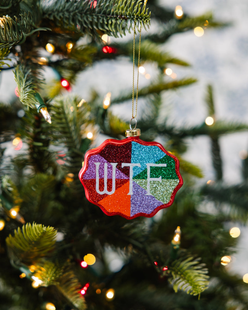 Colorful ornament with 'WTF' on a Christmas tree