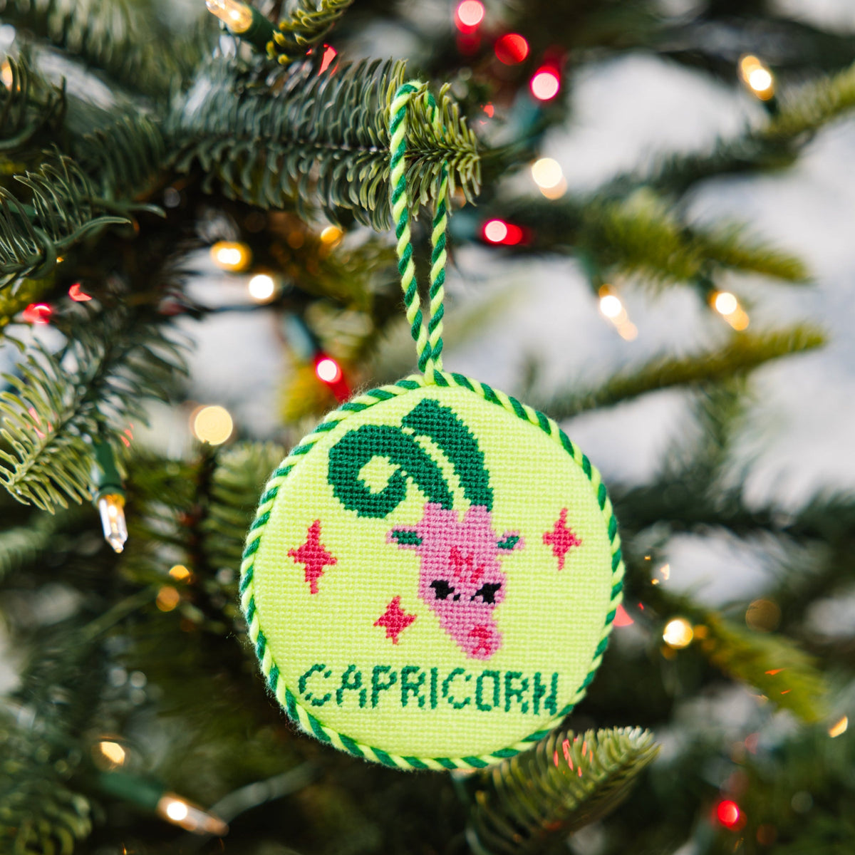 Decorative ornament with Capricorn design on a Christmas tree