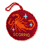Round red embroidered patch with Scorpio design and 'SCORPIO' text on a white background