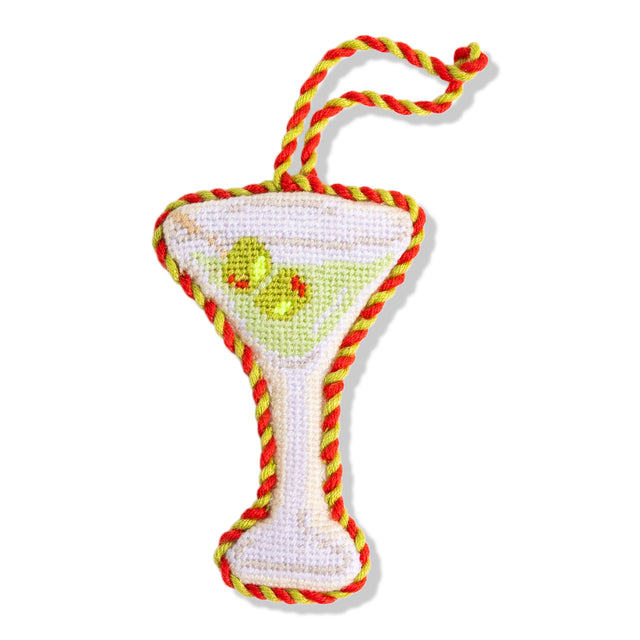 Dog toy shaped like a martini glass with red and yellow rope on a white background