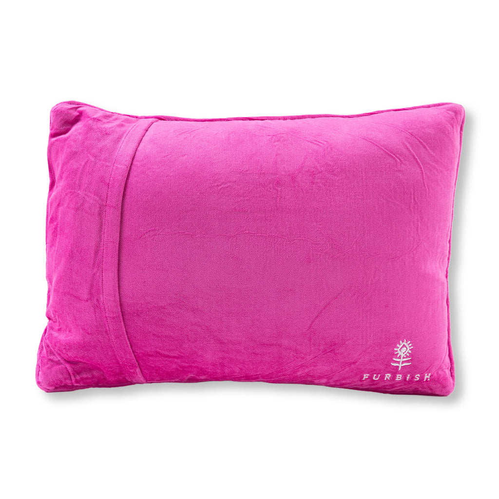 Pink pillow with a visible brand logo on a white background