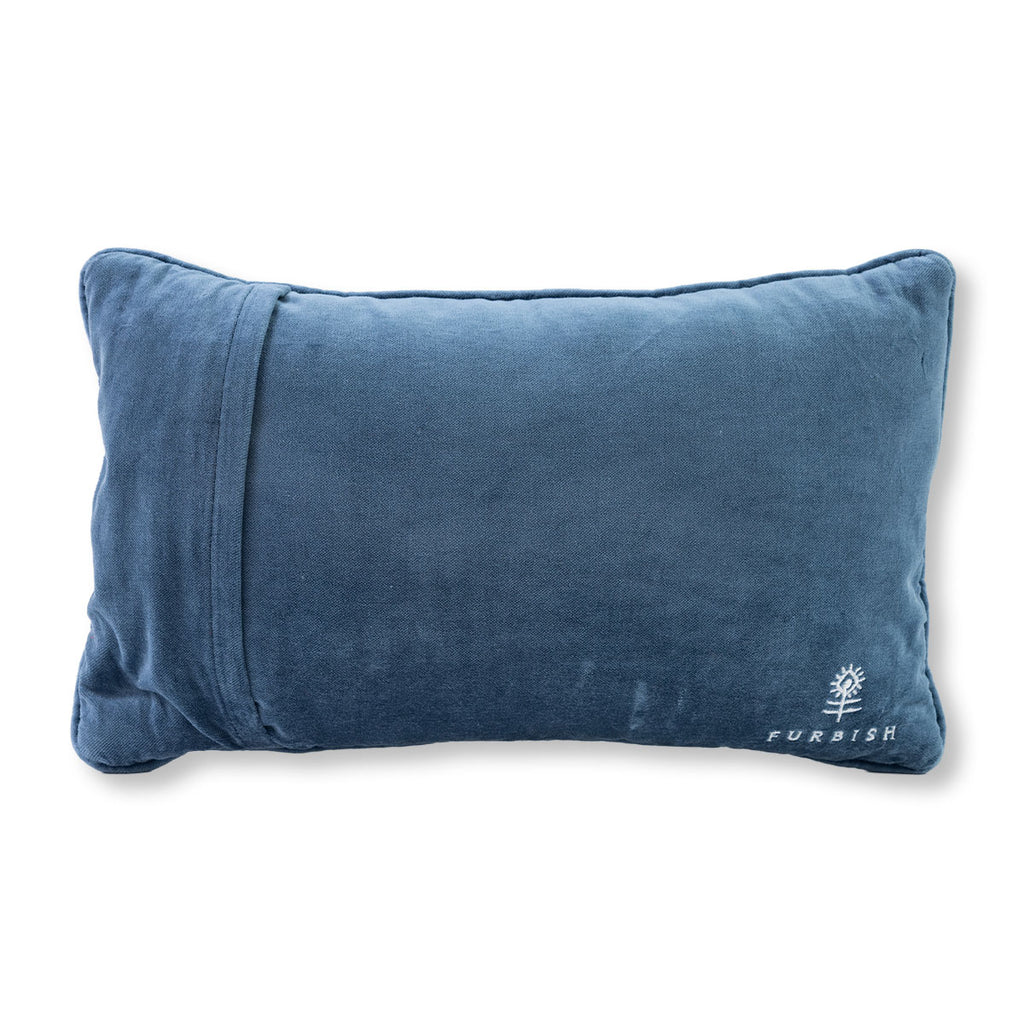 Blue pillow with a brand logo on a white background