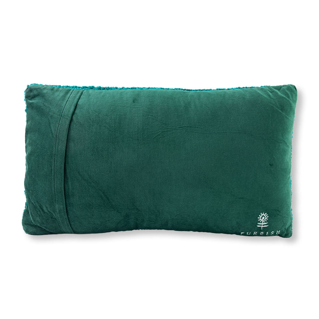 Green pillow with a brand logo on a white background