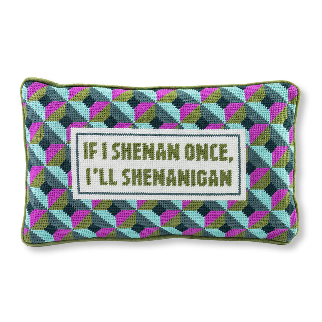 Decorative pillow with geometric pattern and text on a white background