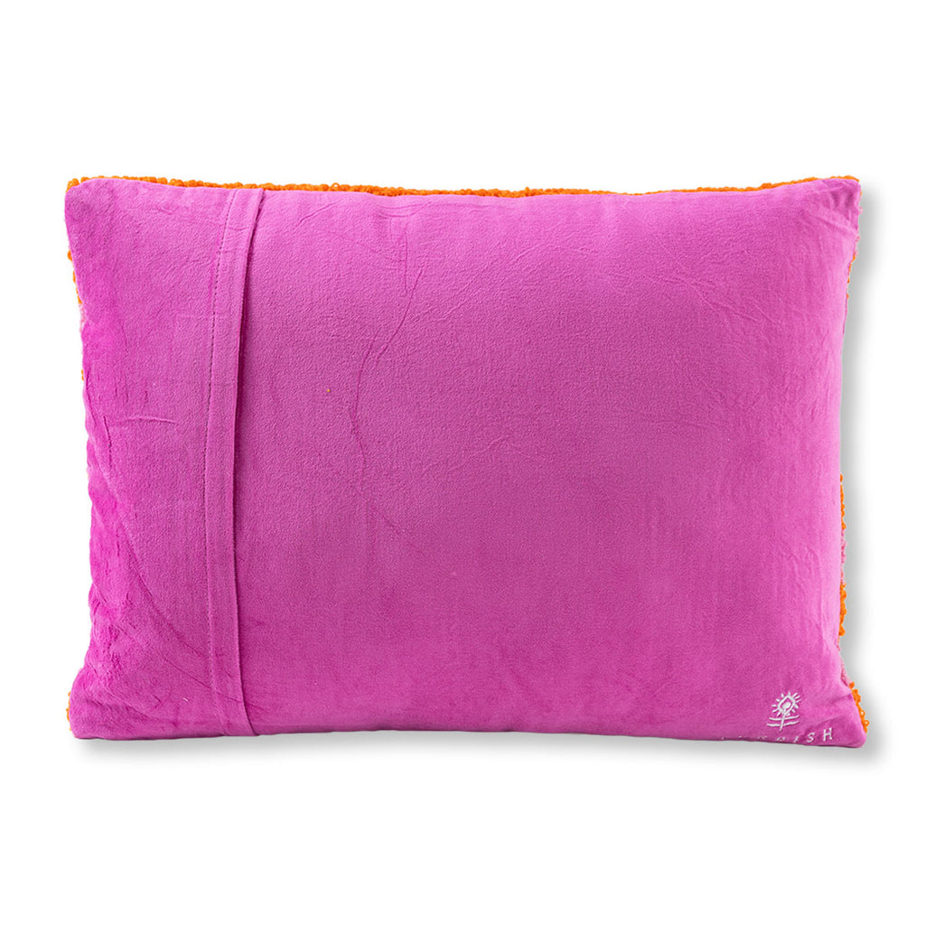 Pink pillow with orange trim on a white background