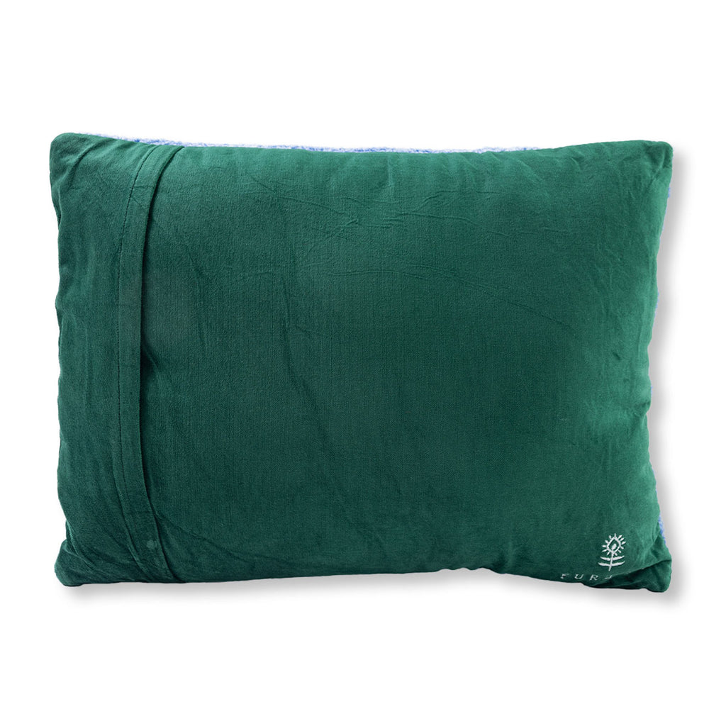 Green pillow on a white background