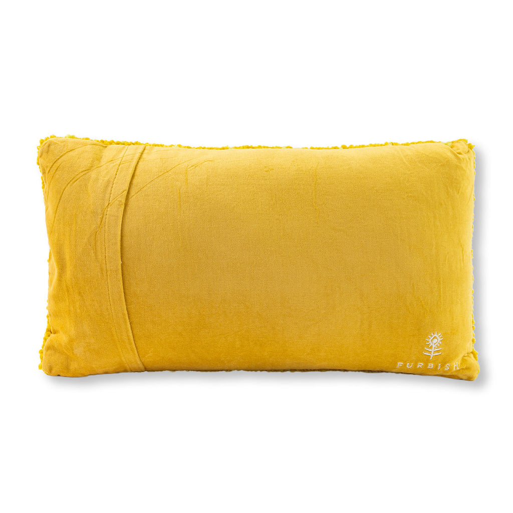Yellow pillow with a brand logo on a white background