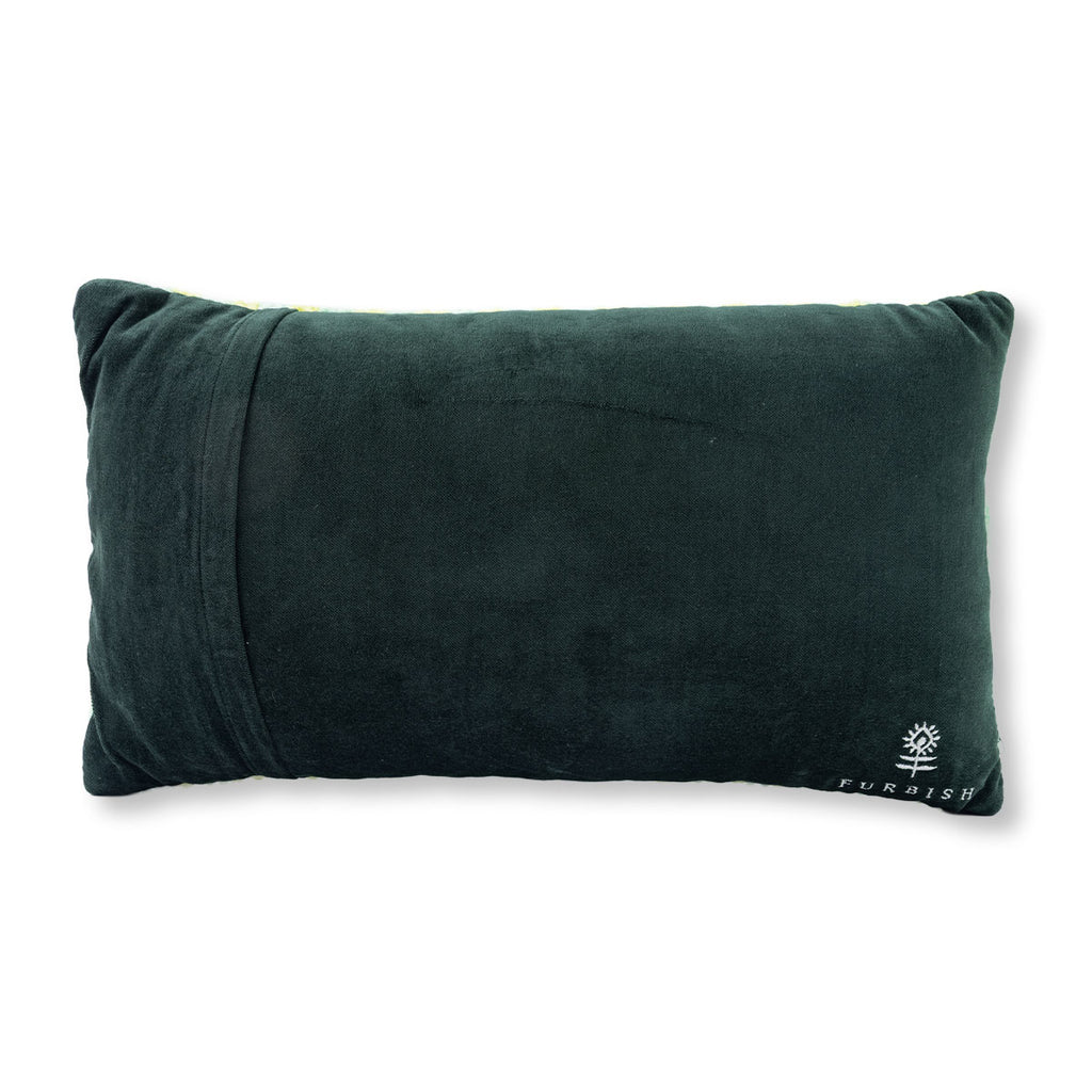 Dark green pillow with a brand logo on a white background