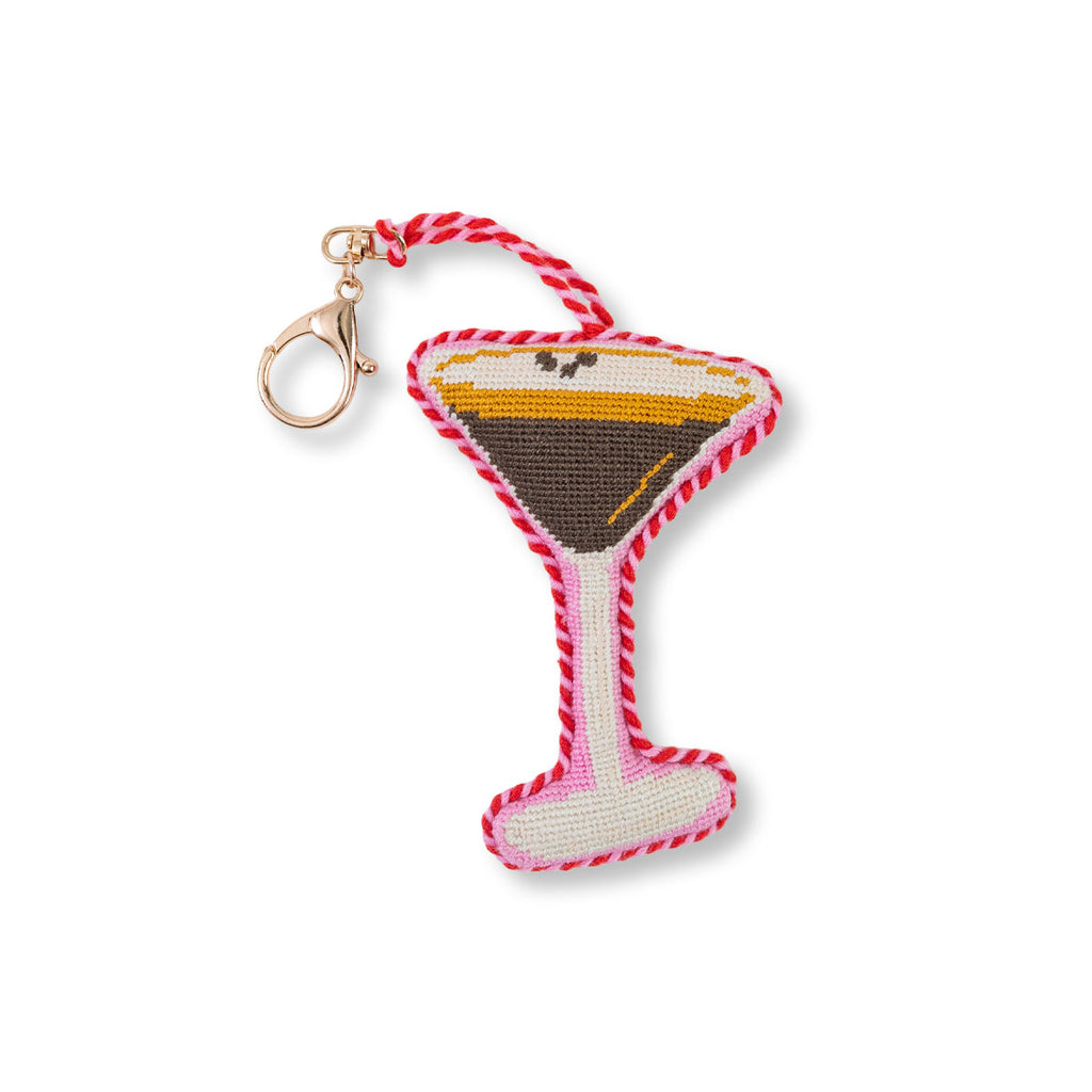Martini glass keychain with red and white rope on a white background