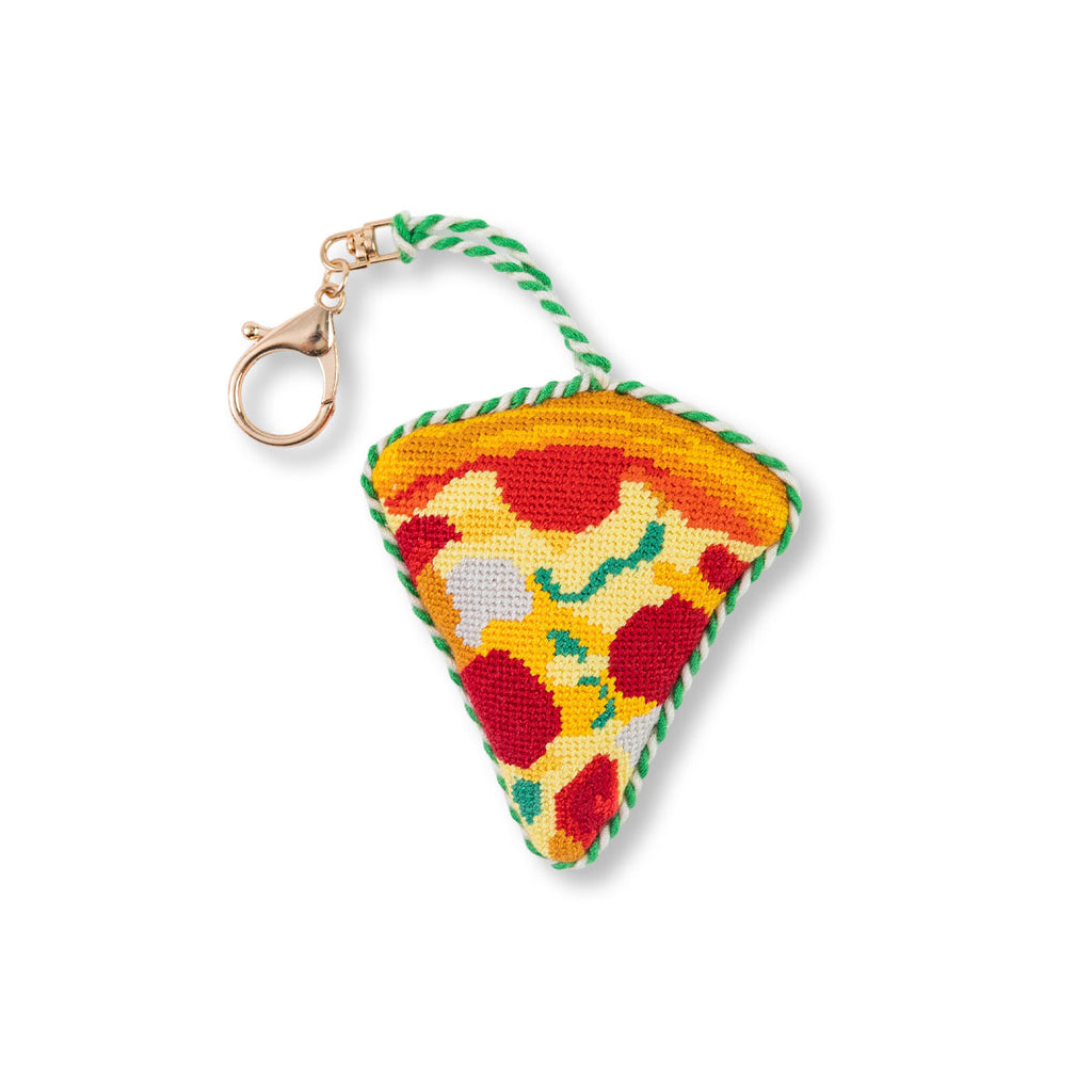 Colorful pizza-shaped keychain on a white background