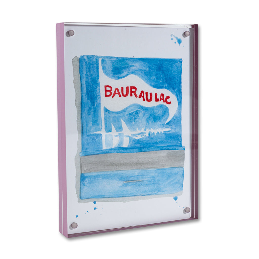 Baur Au Lac Matchbook - Furbish Studio, A Bauraulac matchbook watercolor print featuring sailing boats with a sky blue background color resembling the Bauraulac Hotel's surroundings enclosed in a 5" x 7" mauve magnetic acrylic floating frame