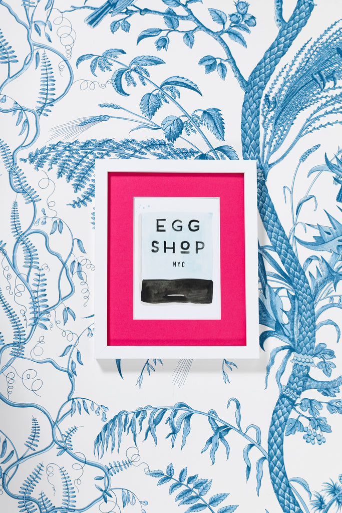 Egg Shop NYC Matchbook - Furbish Studio, A  matchbook watercolor print with Teal and black water color painting titled "Egg Shop" and "NYC" at the bottom on archival paper in a white and pink frame