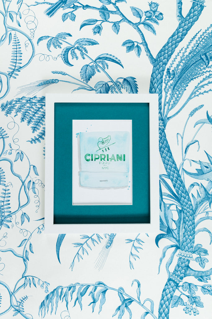 Cipriani Matchbook - Furbish Studio, A matchbook watercolor print illustrating the Cipriani's logo with an aqua and gray shades background  with a 5x7 white frame with a wallpaper background