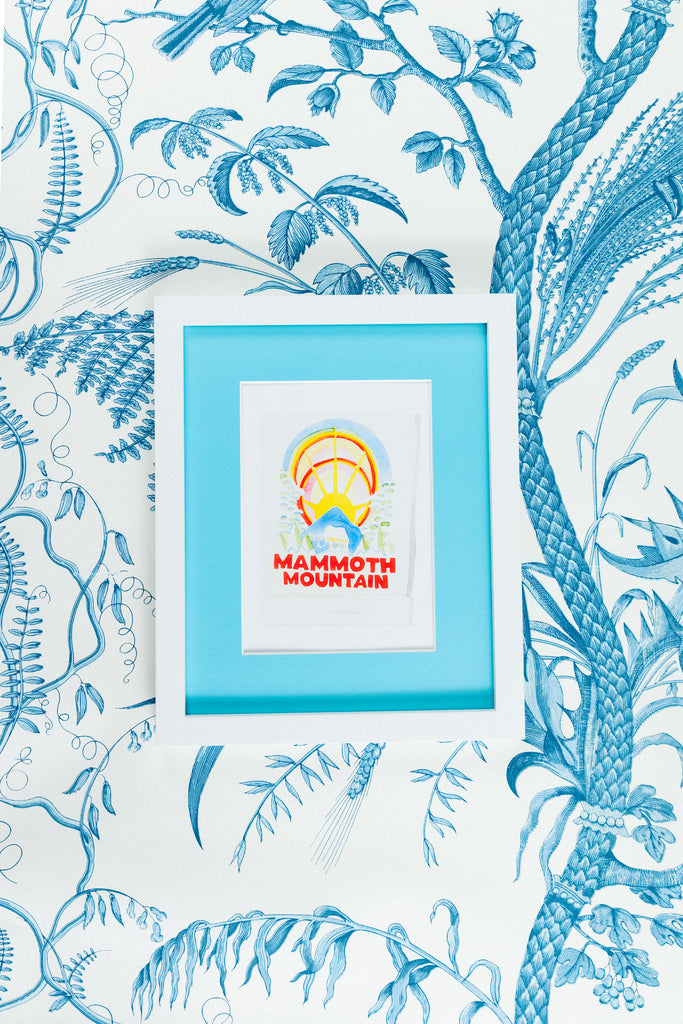 Mammoth Mountain Matchbook - Furbish Studio,  Mammoth Mountain matchbook watercolor print with an elephant painted in the middle with a white background in a 5x7 white frame with a wallpaper background