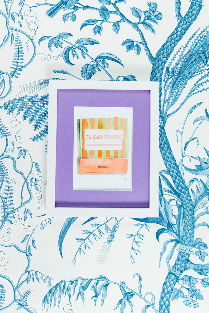 Il Cantinori Matchbook - Furbish Studio, An Il Cantinori matchbook watercolor print with the restaurant awning's design painted in orange and yellow-green and "IL CANTINORI" is painted in the middle in a 5x7 white frame with a wallpaper background