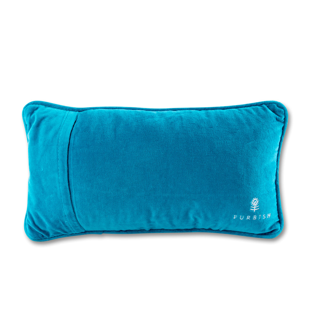 back view of the luxe blue green chic hand needlepoint pillow with a furbish text print and logo located on the bottom right-hand corner of the pillow