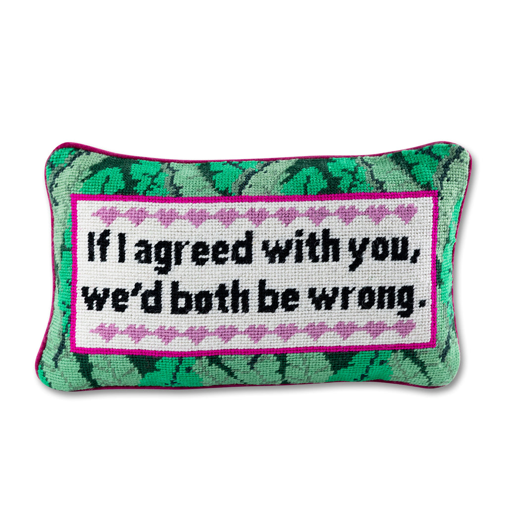 front view of the luxe magenta velvet chic hand needlepoint pillow with "If I agreed with you we'd both be wrong" saying written in black and surrounded by pink hearts and green leafy designs