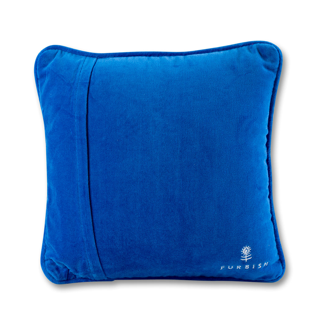 back view of the luxe blue grey velvet chic hand needlepoint pillow with a furbish text print and logo located on the bottom right-hand corner of the pillow