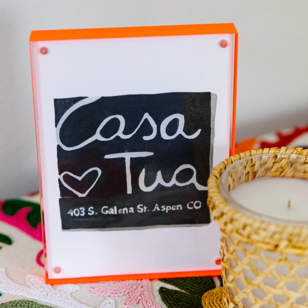 Casa Tua Matchbook - Furbish Studio, Casa Tua matchbook watercolor print with a black background color paint and "403 S. Galena St. Aspen CO" painted in white at the bottom enclosed in a 5" x 7" orange magnetic acrylic floating frame