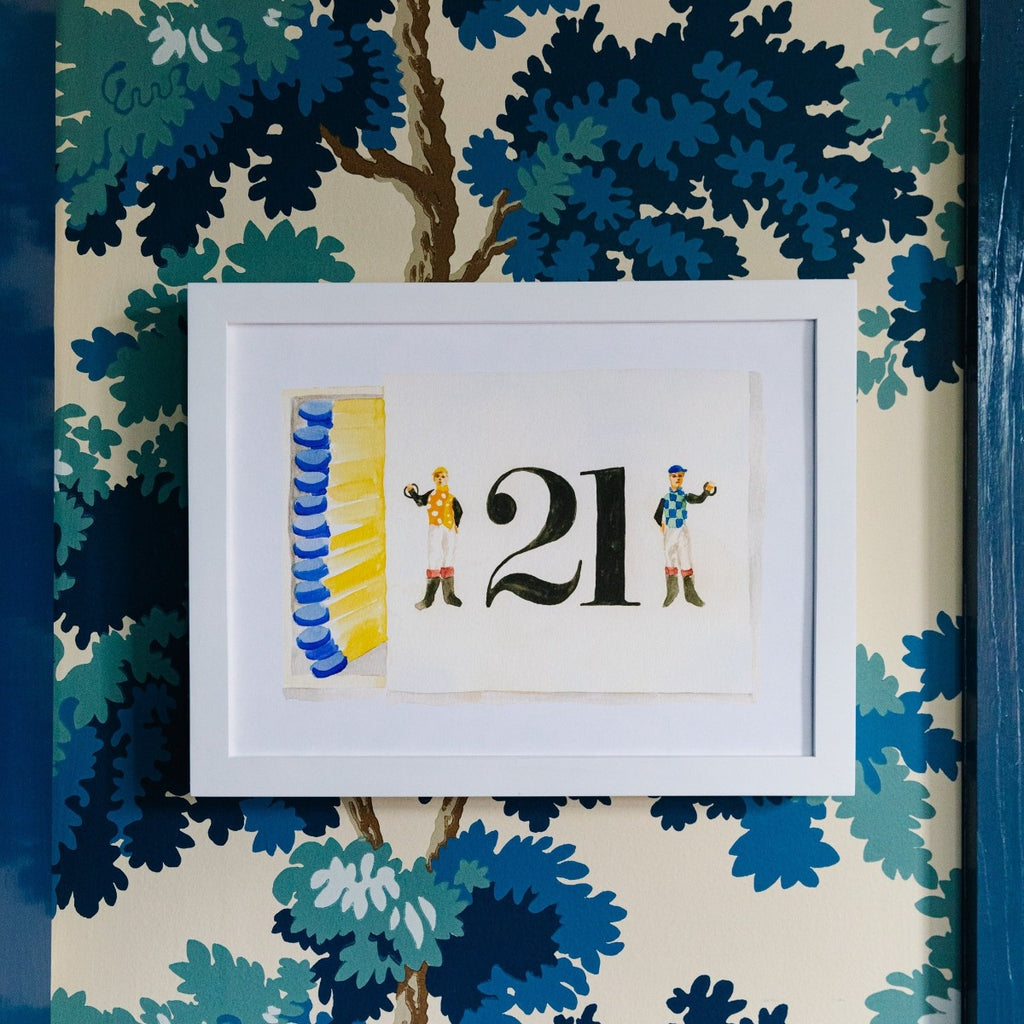 Club 21 Matchbook - Furbish Studio, Club 21 matchbook watercolor print illustrating Club 21's logo from their website which is painted on top of a painted matchbox with yellow matches inside and blue heads in a white frame while attached to the wall