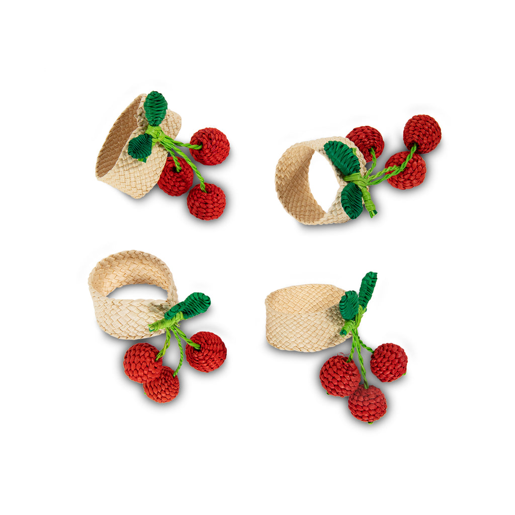 Furbish - Cherry Napkin Ring - Add charm and whimsy to your spring and summer table setting or picnic with these handmade cherry napkin rings. Show off your hostess skills by sliding a perfectly folded cloth napkin into this eye-catching fruity ring. Made of all natural raffia fibers.