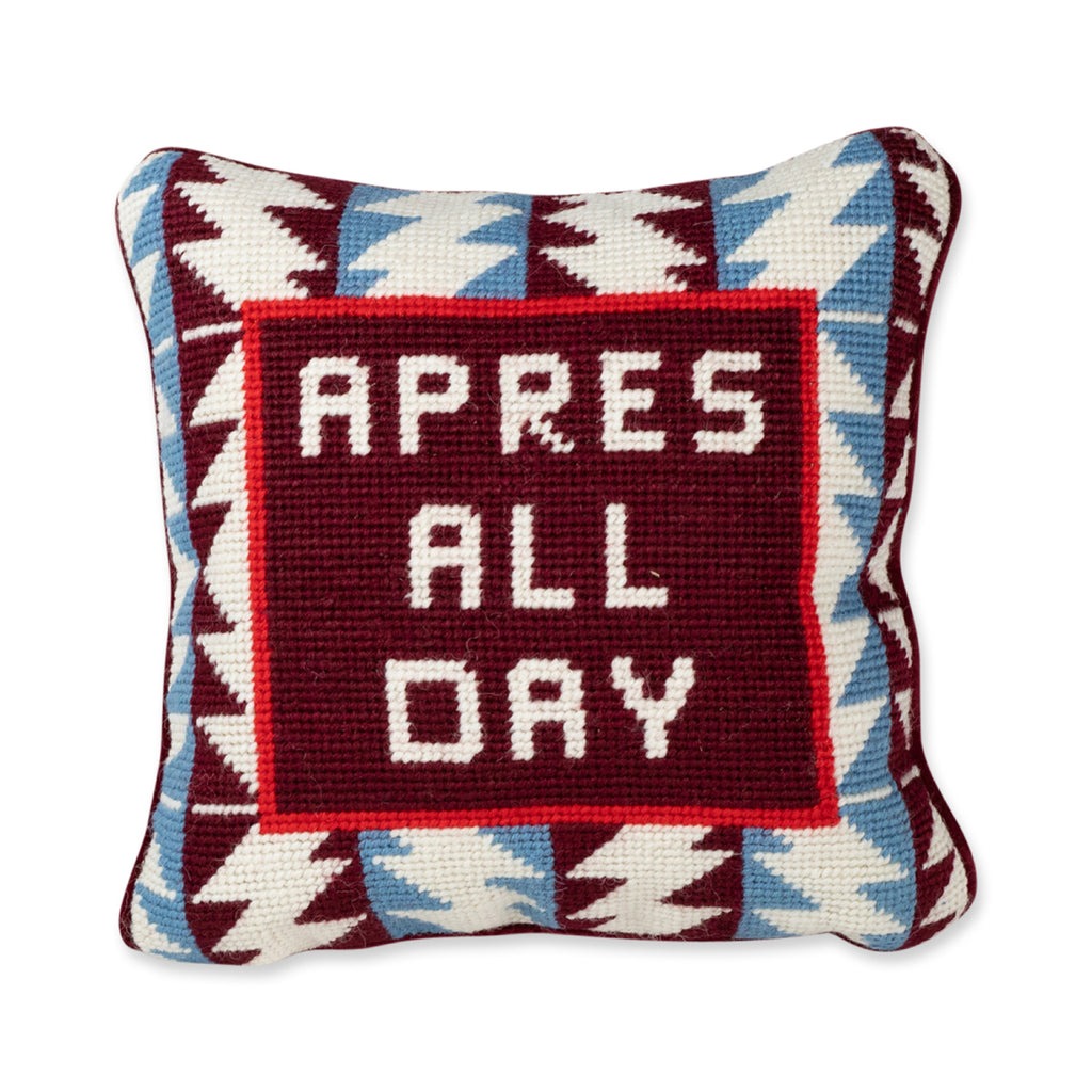 Apres Ski Needlepoint Pillow - Furbish Studio, a detailed view of the luxe maroon velvet chic hand needlepoint pillow with "Apres all day" saying in front