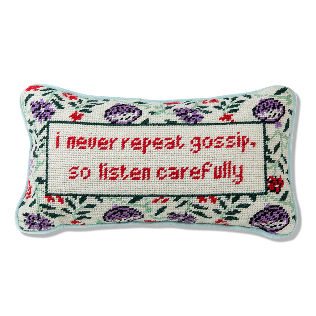 a closer look of a hand embroidered in wool and backed in luxe mint green velvet chic needlepoint pillow with "I never repeat gossip, so listen carefully" cheeky saying in front