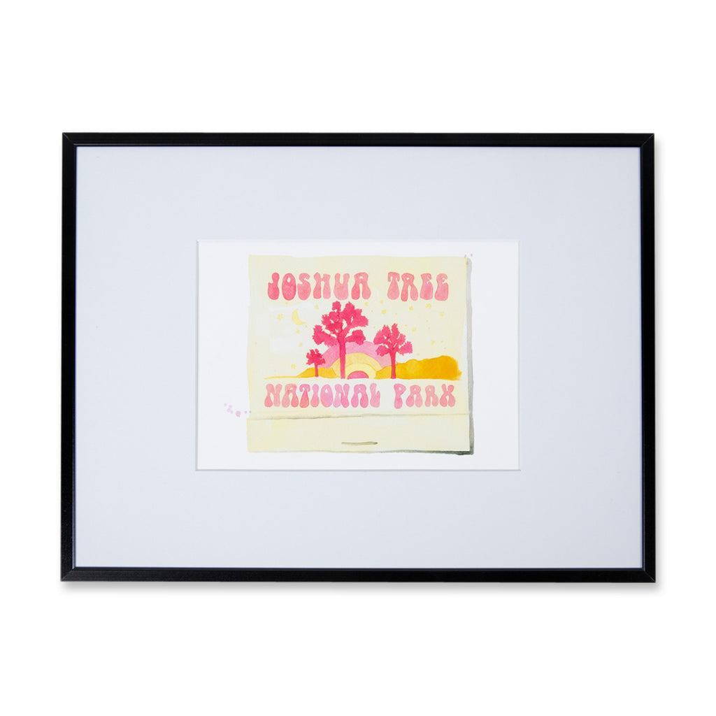 Joshua Tree Matchbook - Furbish Studio, "Joshua Tree National Park" matchbook watercolor print illustrating the park's beautiful scenery painted in a pink and yellow shade in a 5x7 black frame 