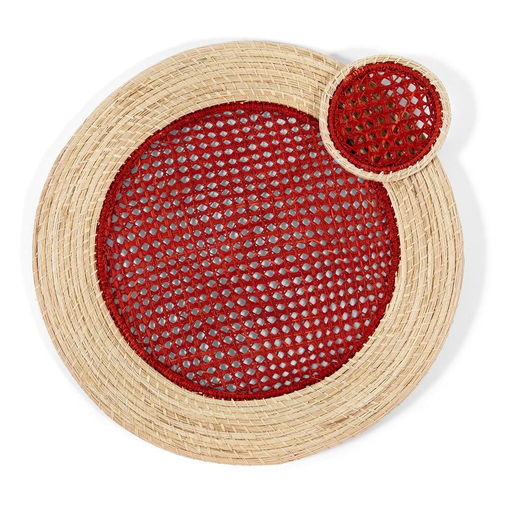 Furbish Studio - Red Raffia Placemats - Add fresh charm to your spring and summer table setting or picnic with this set of 4 handmade, red raffia placemats. Show off your hostess skills by creating a gorgeous tablescape using this eye-catching table accessory. Made of all natural raffia fibers with a pink woven center design and neutral raffia coiled edge.