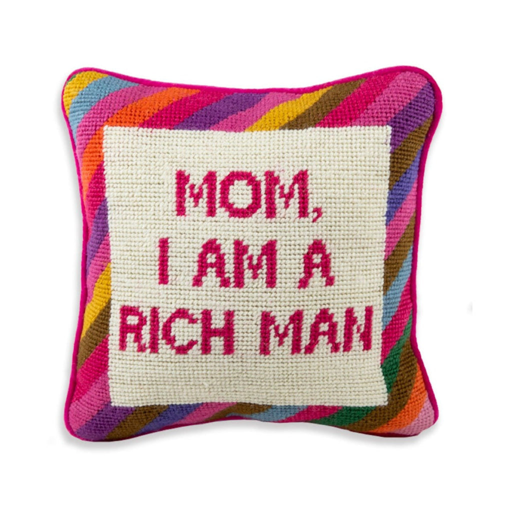 a closer look at this luxe pink velvet charming-meets-chic hand needlepoint pillow with "Mom, I am rich man" saying in front.
