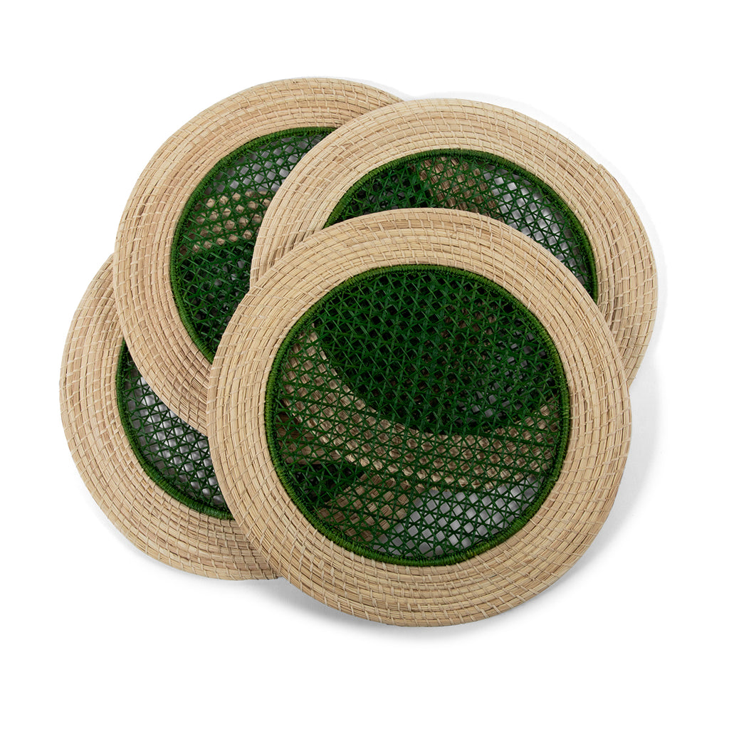 Furbish Studio - Green Raffia Placemats - Add fresh charm to your spring and summer table setting or picnic with this set of 4 handmade, green raffia placemats. Show off your hostess skills by creating a gorgeous tablescape using this eye-catching table accessory. Made of all natural raffia fibers with a pink woven center design and neutral raffia coiled edge.